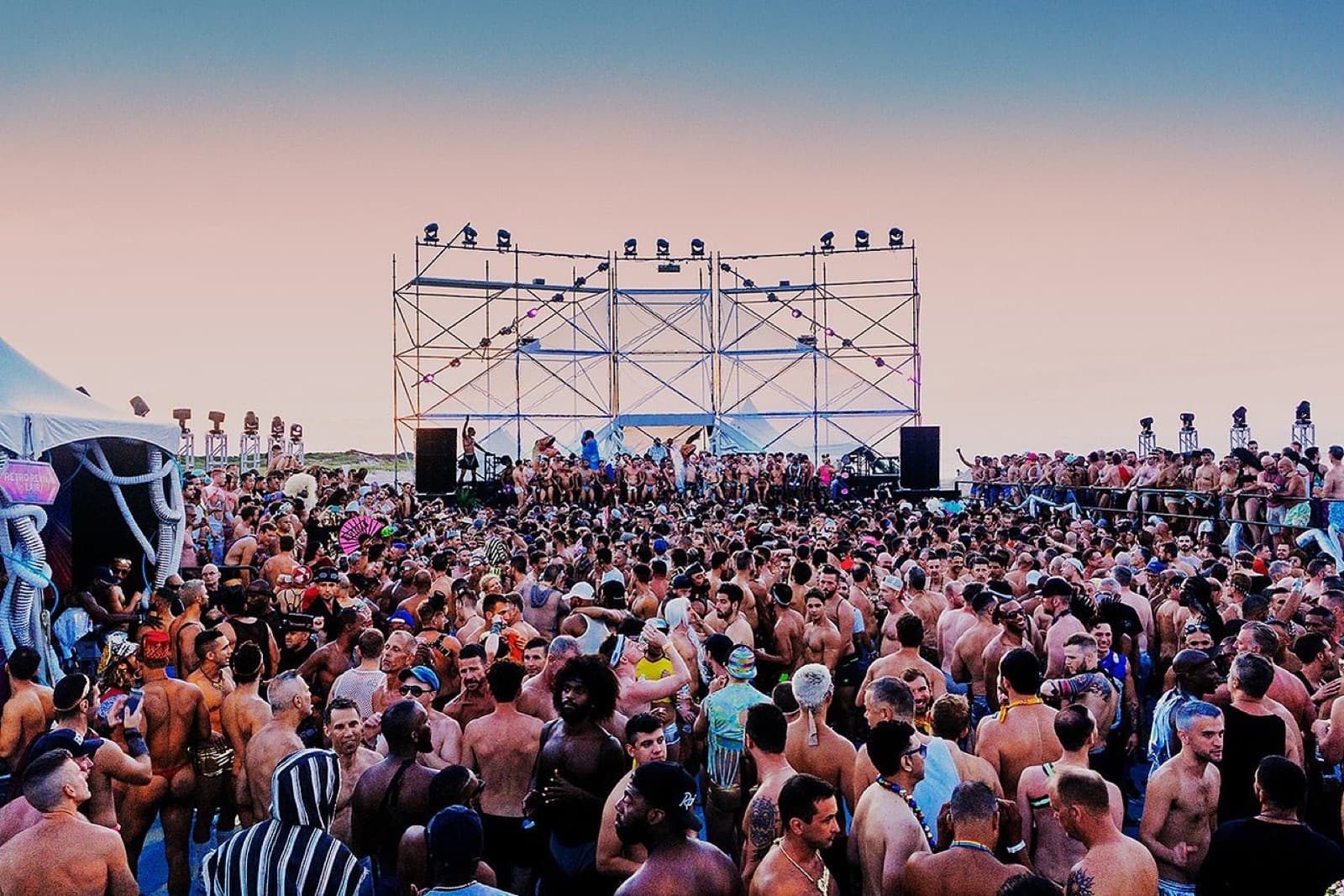 Open-air dancefloor at dusk by the water