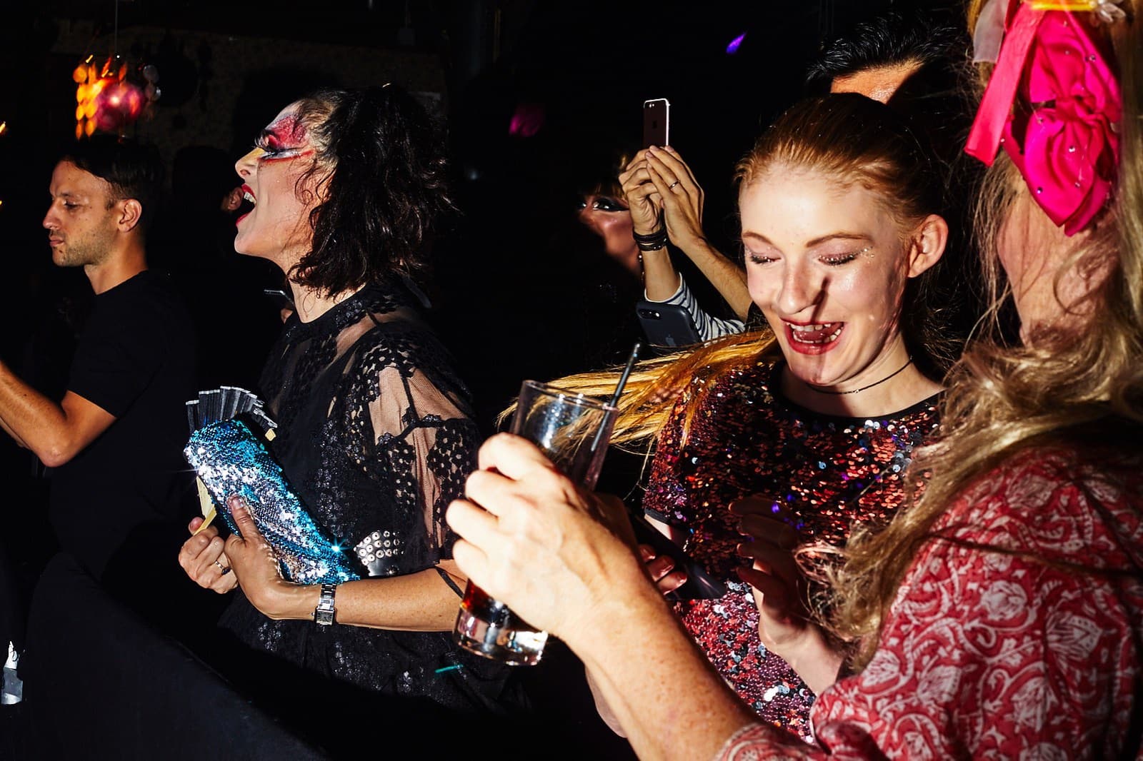 Crowd cheering at a New York party