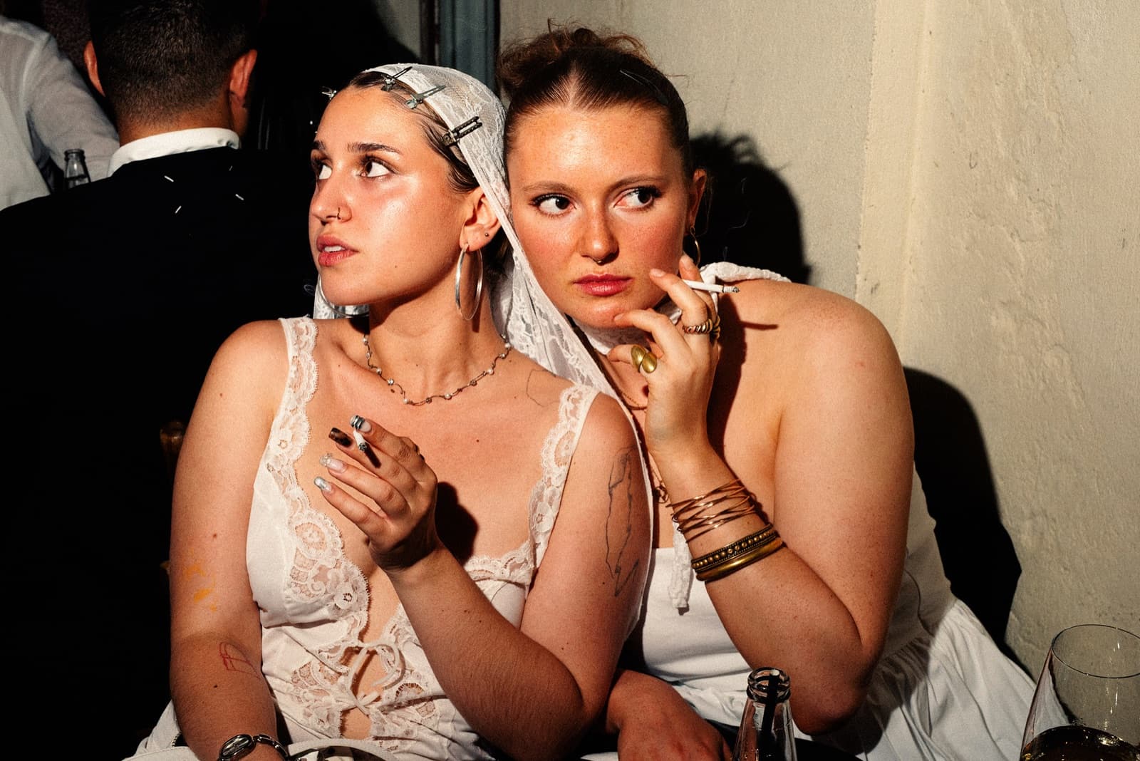 Guests in lace at a wedding after-party